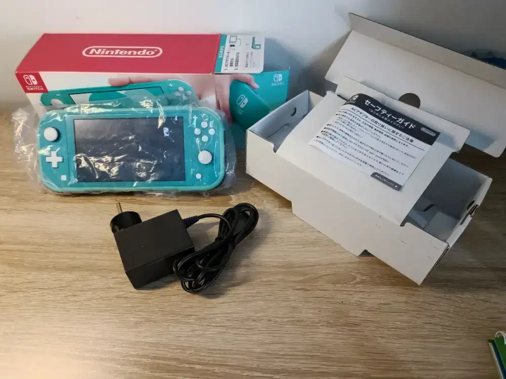 Nintendo Switch Lite: Premium Teal, Brand New + FREE Screen Protector