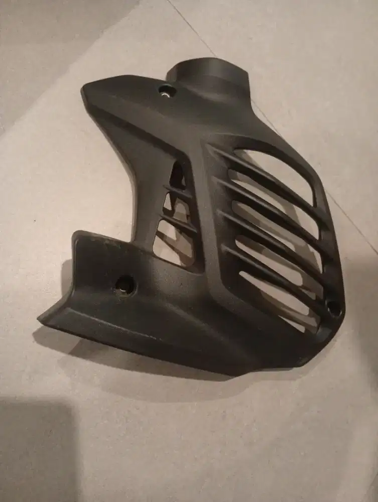 black plastic radiator cover for a Yamaha NMAX 