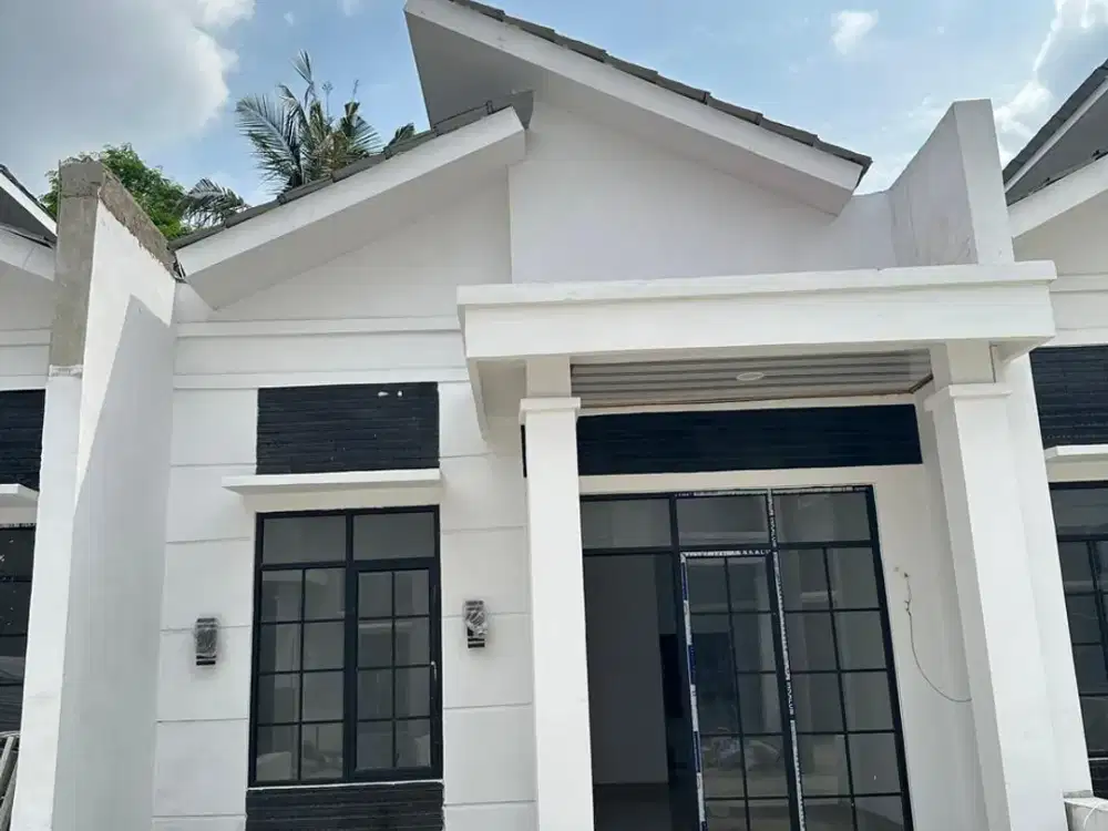RUMAH DENGAN DESAIN ELEGAN DAN LOKASI PALING STRATEGIS
