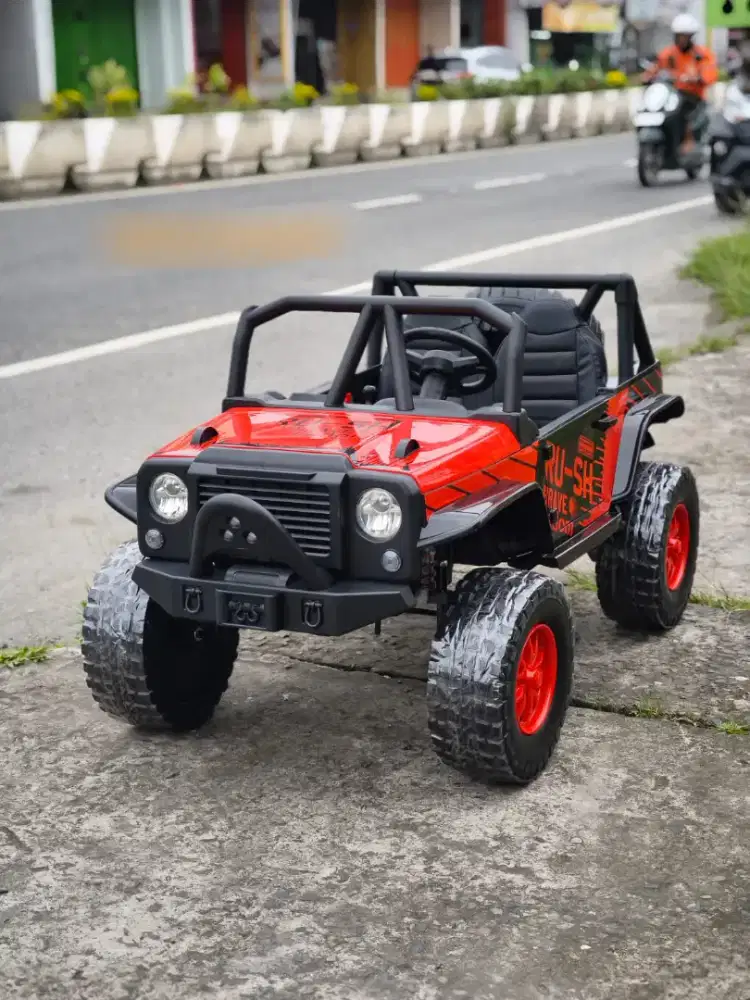 Mobil Aki Jeep Yukita 8989 jumbo sudah ban karet jok kulit, bergaransi