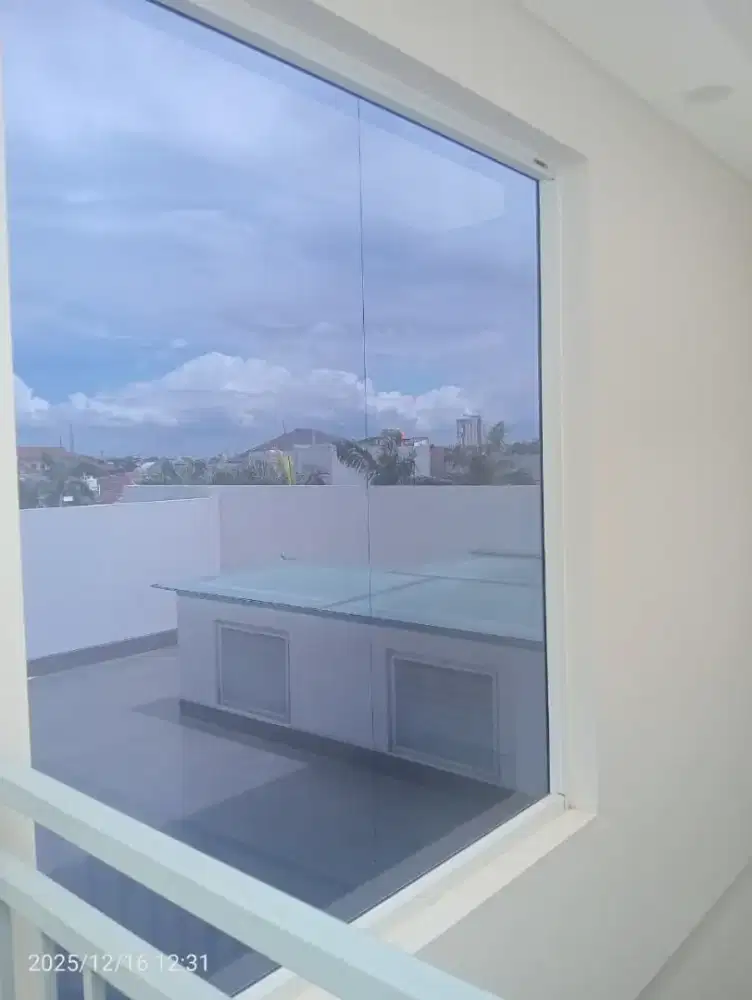 Jasa Pasang Sticker kaca film Rumah