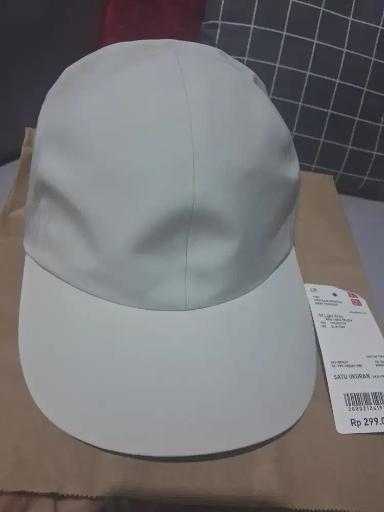 Topi anti UV uniqlo