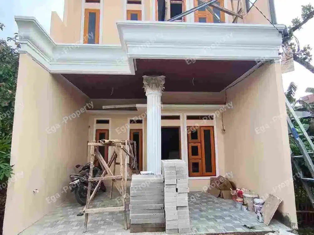 Rumah 2 lantai sudah free canopi dan keramik carport