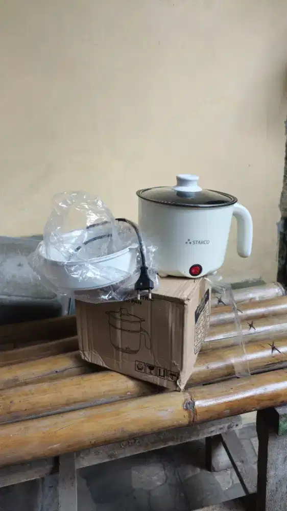 Kompor listrik bentuk panci