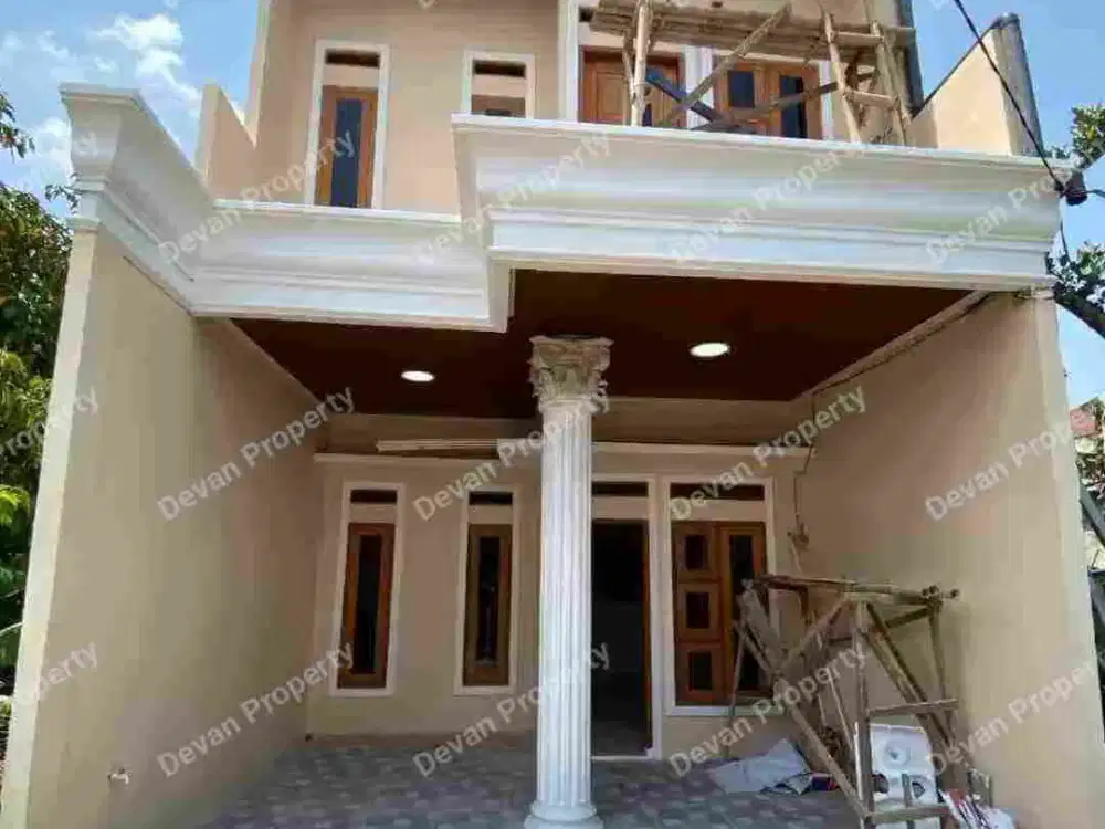 Rumah 2 lantai sudah free canopi dan keramik carport..