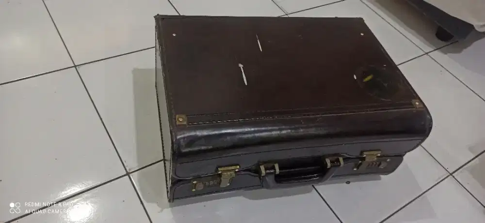 Tas koper kulit th 75-an