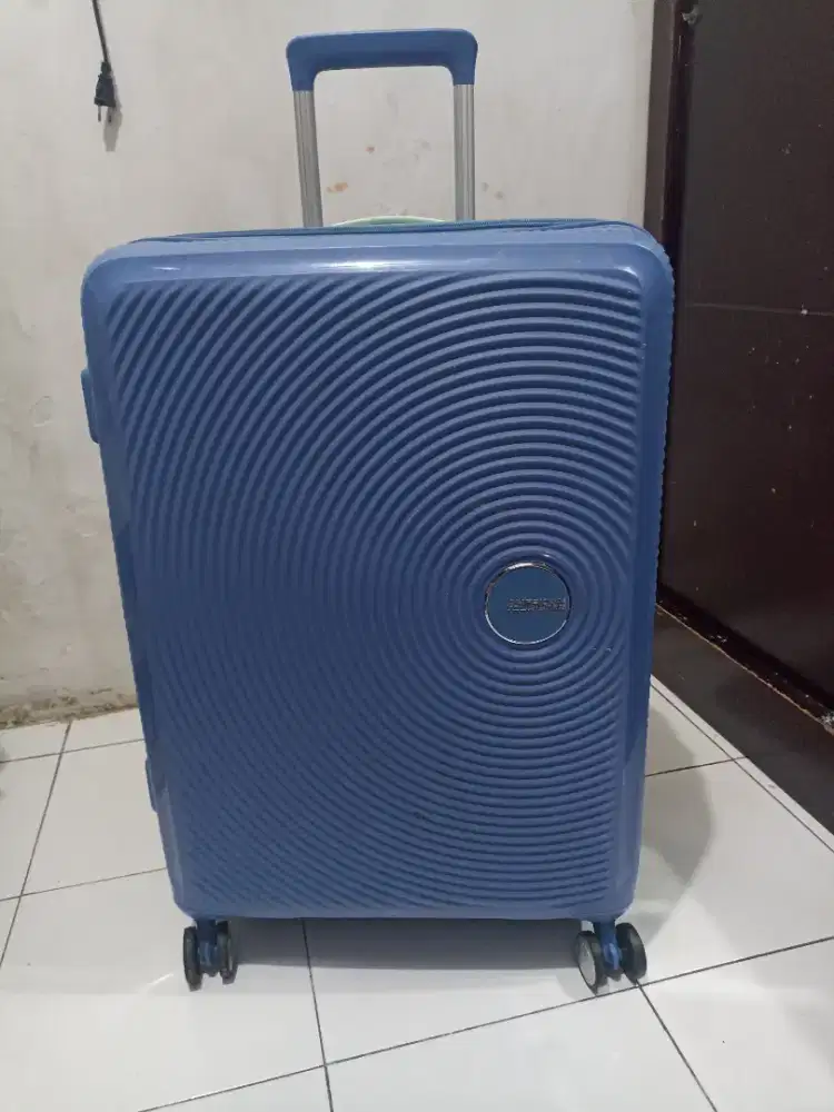 American tourister curio 24inc