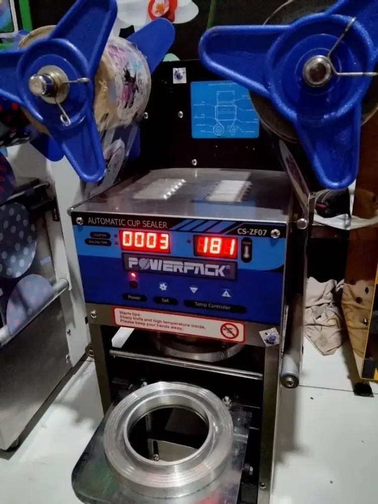 Cup sealer semi otomatis