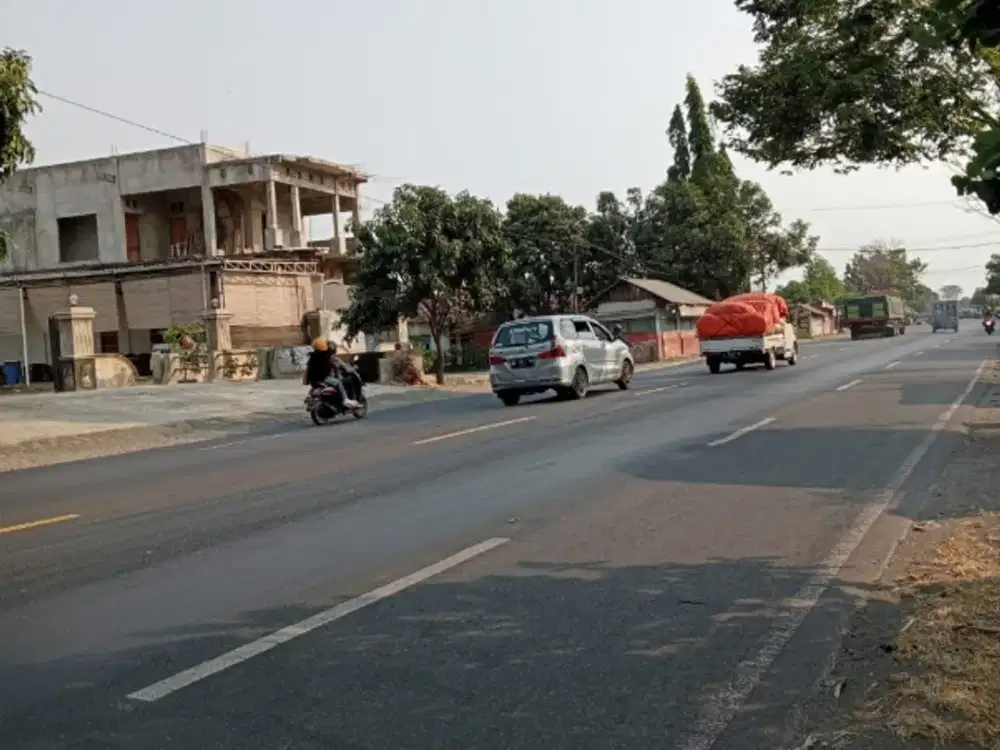 d jual tanah + rumah  sudah pagar keliling bagus untuk klinik ,showroom ,gudang 0 jalan raya propinsi