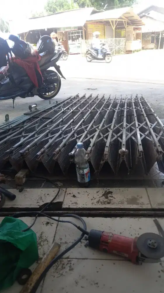 Tukang service rolling door folding gate termurah