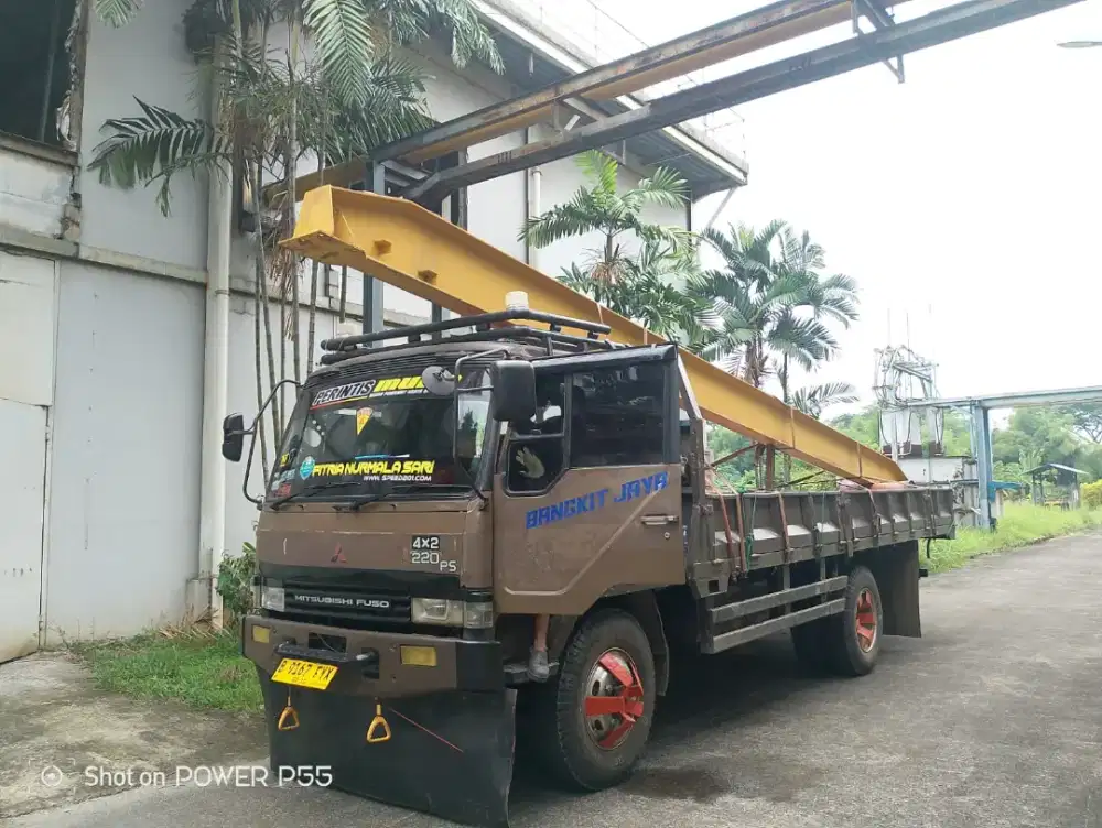 Sewa truk Fuso losbak angkut barang cikarang