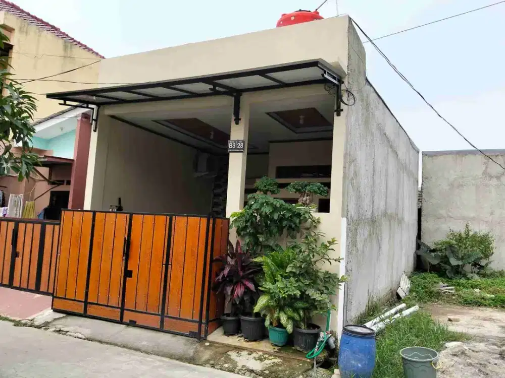 RUMAH SIAP HUNI TANPA PERLU RENOVASI LAGI, SUDAH ADA TORN AIRNYA, PDAM, PAGAR, PLAVON TERAS PVC, PLAVON RUANG TAMU PVC