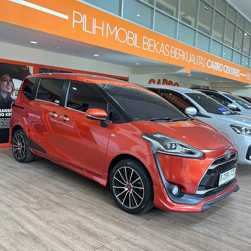 Toyota Sienta Q AT 2017 Orange - DP 9 JUTA