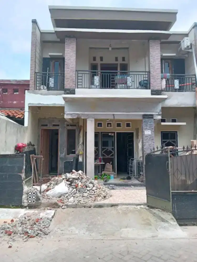 Tukang bangunan harian dan borongan