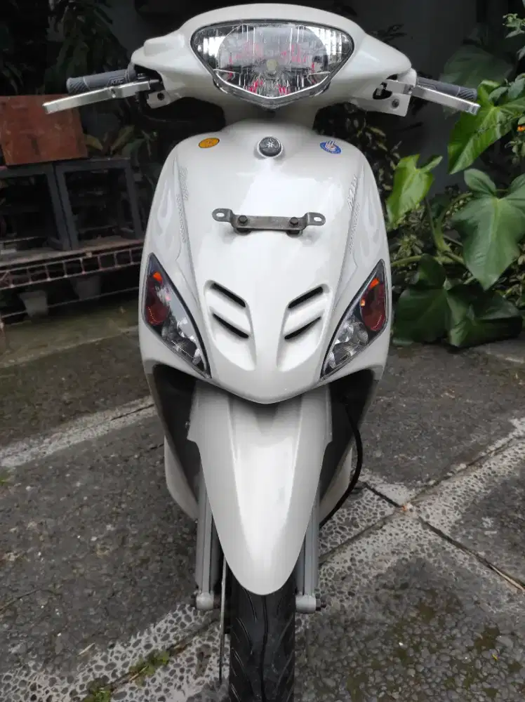 Mio smile 2009 abu abu convert