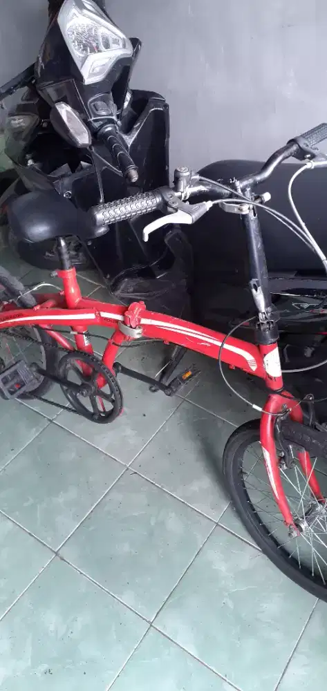 sepeda lipat tinggal gowes ukuran 20 siap pakai