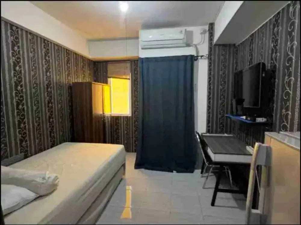 Disewakan Apartemen Puncak Dharmahusada Studio Tinggal Bawa Koper