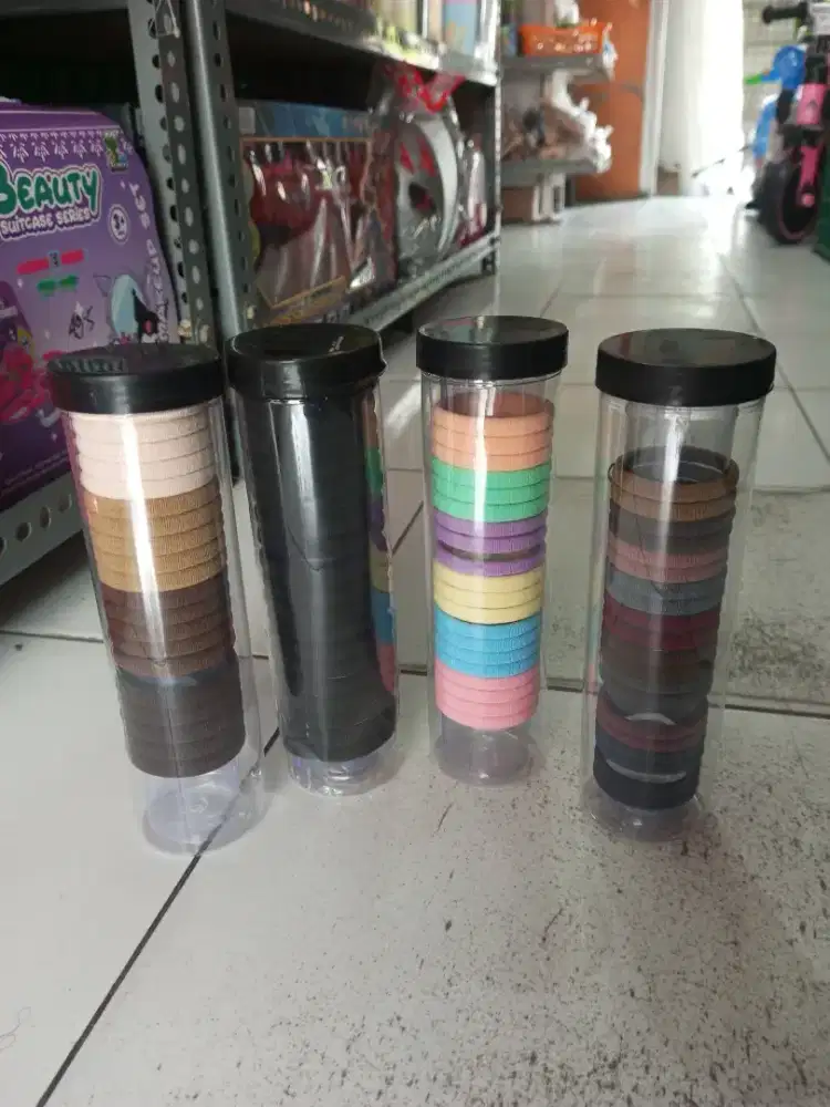 Mainan anak kucir donat karet