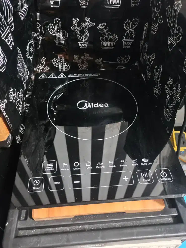 Kompor listrik Midea 1600w