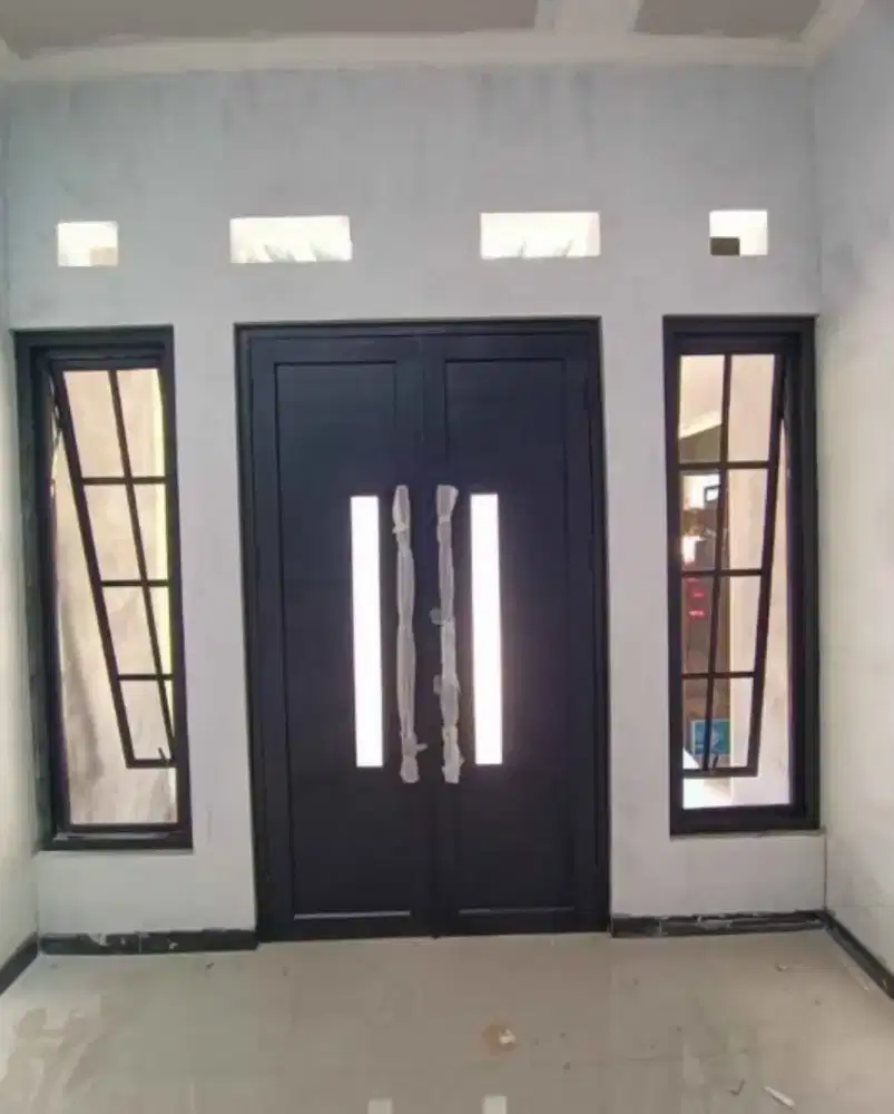 Pemasangan kusen pintu dan jendela aluminium