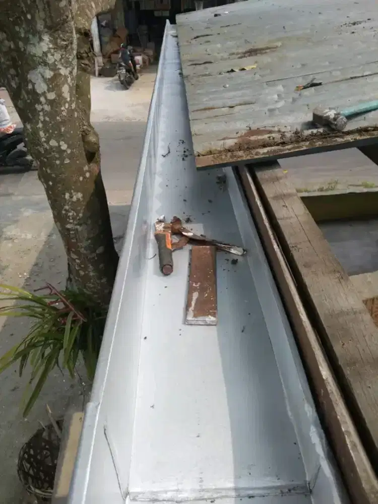 Tukang perbaikan talang dan kebocoran dll