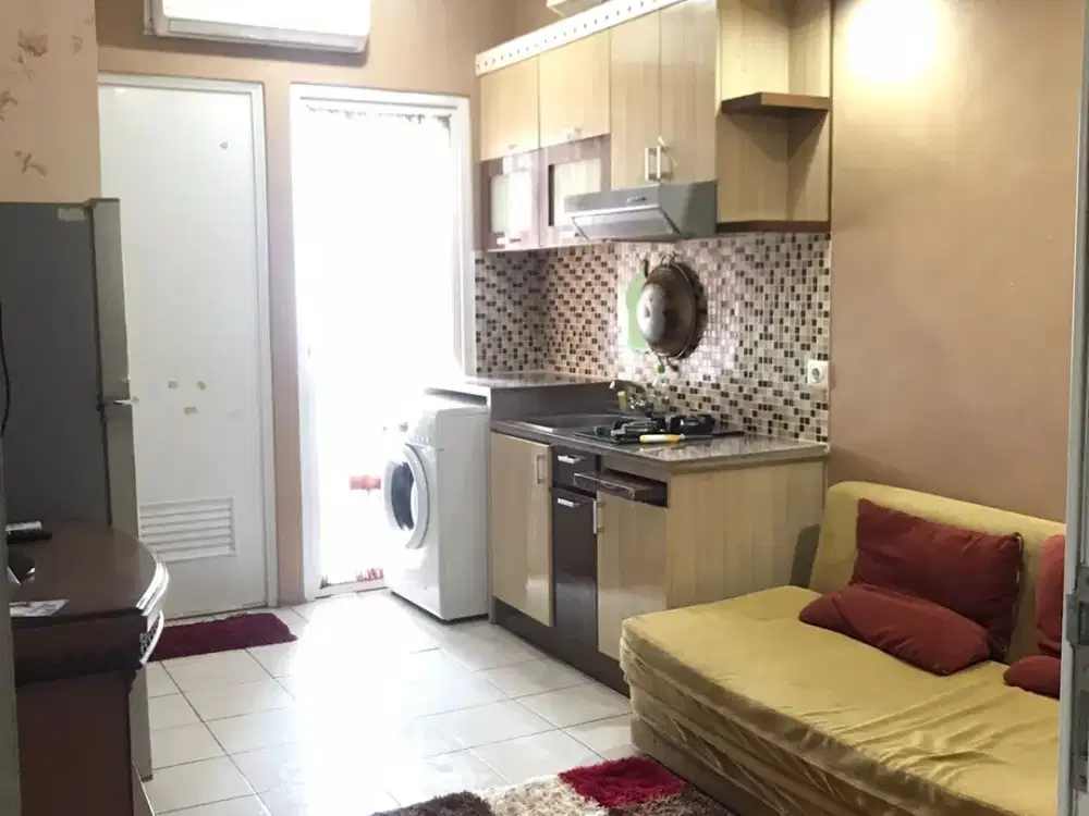 Apartemen the green pramuka city 2 kamar furnish