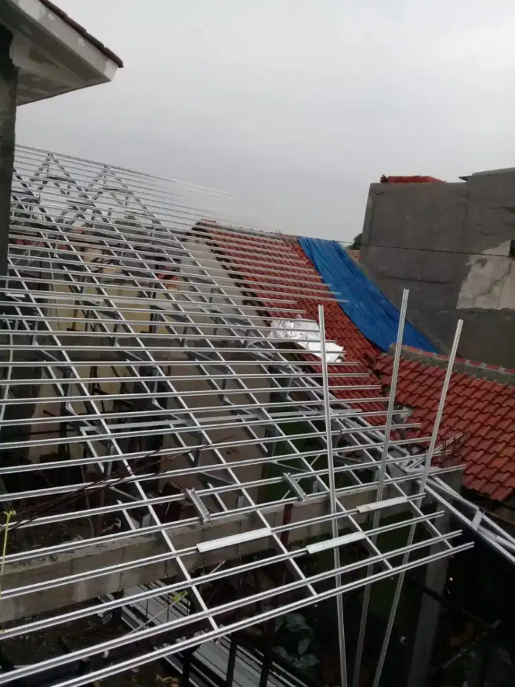 bongkar atap lama ganti baja ringan