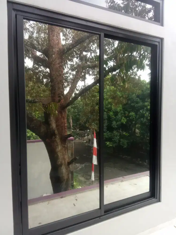 Jasa pasang kaca film rumah