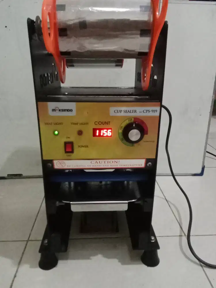 mesin cup sealer merk maksindo