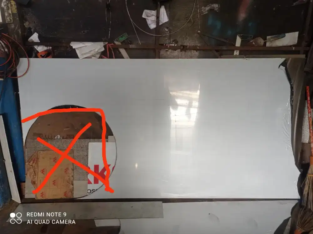 Pelat stainles hairline