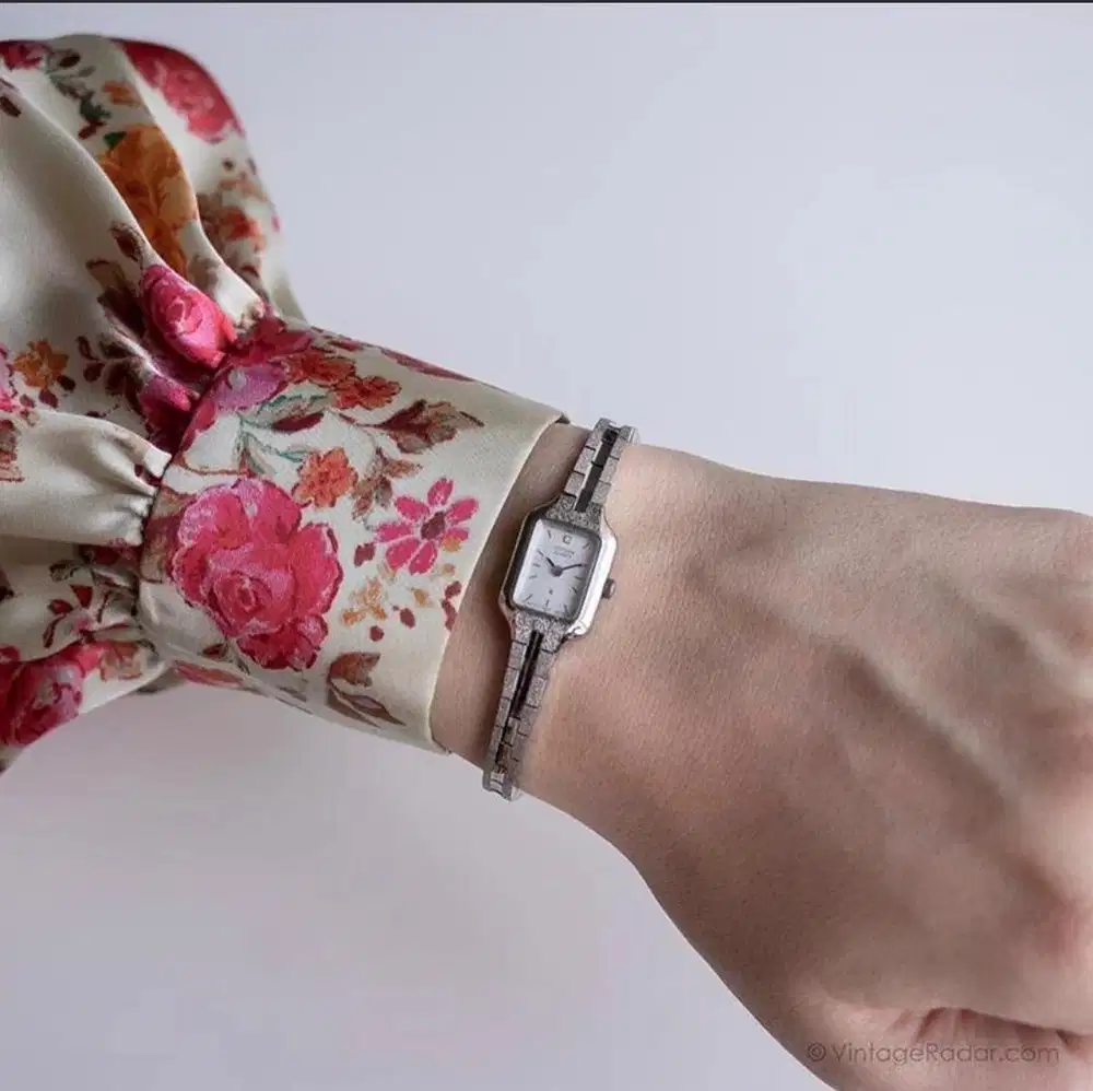 Tiny citizen in silver tone