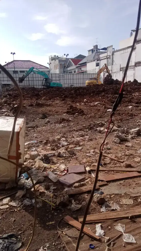 Bobok rumah via escavator  dengan beli rumah bekas atw gedung