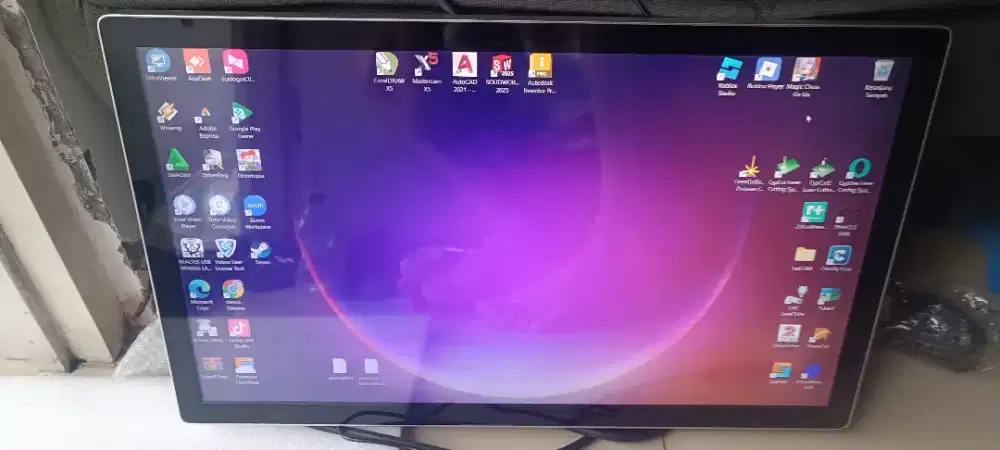 Monitor copotan mesin laser