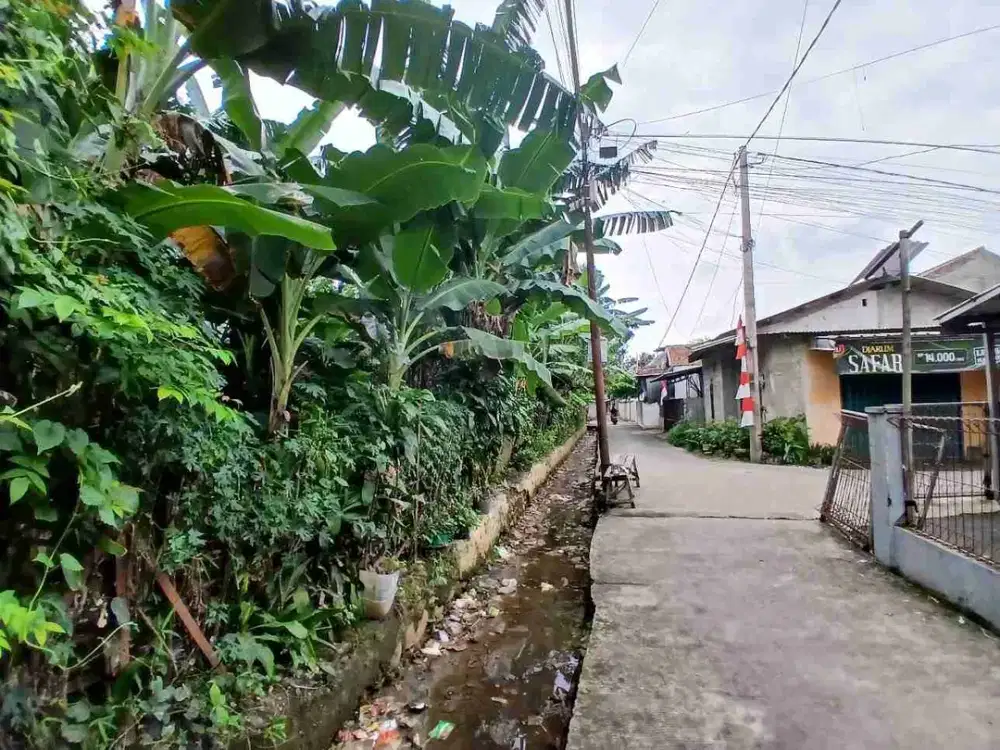 Tanah Huk SHM tepat di pinggir jalan raya cipayung Depo