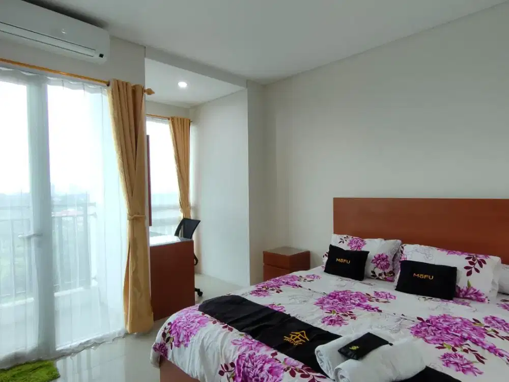 Studio Lantai 5 Tower Mahogani Woodland Park Residence by MoFU