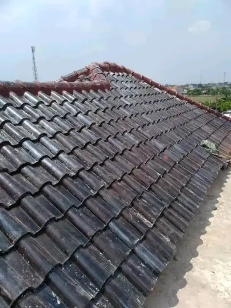 TukanG atap Rmh BocoR.dak Rembes