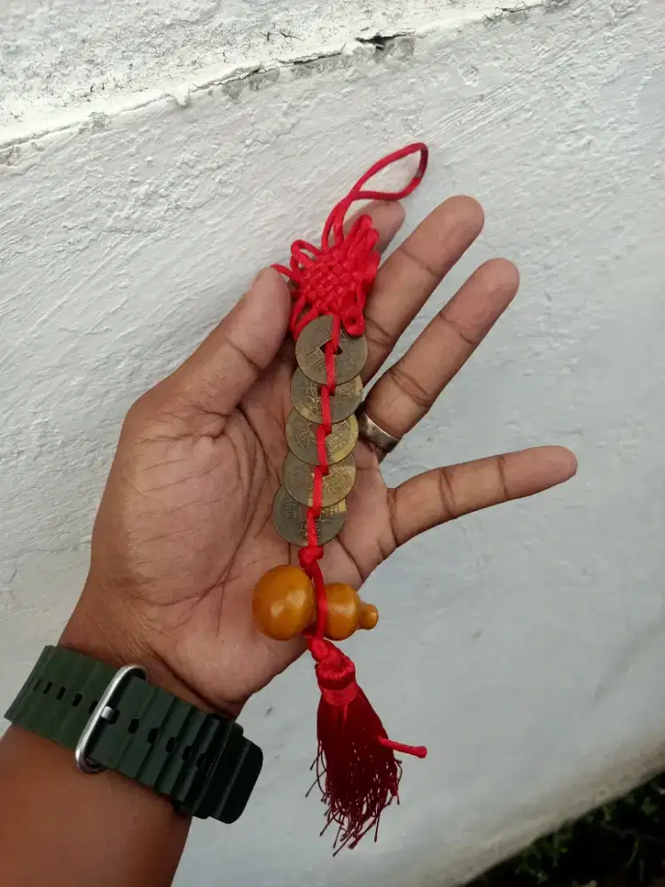 Di jual uang koin  cina lama. Bahan nya Kuningan bisa cod di antar