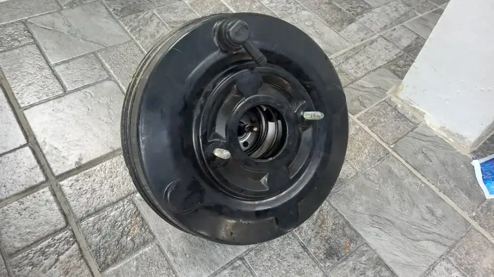 Booster/pakem Rem Nissan March