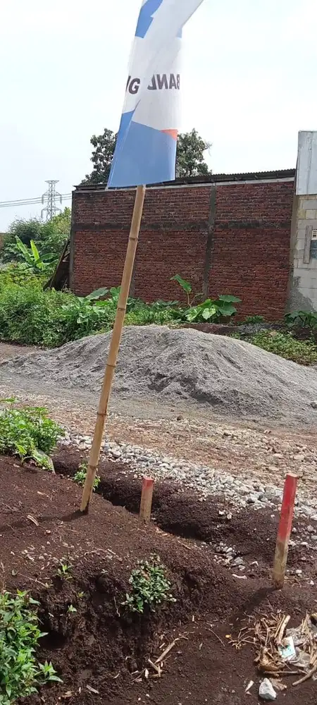 Tanah bangunan perumahan pinggir jalan