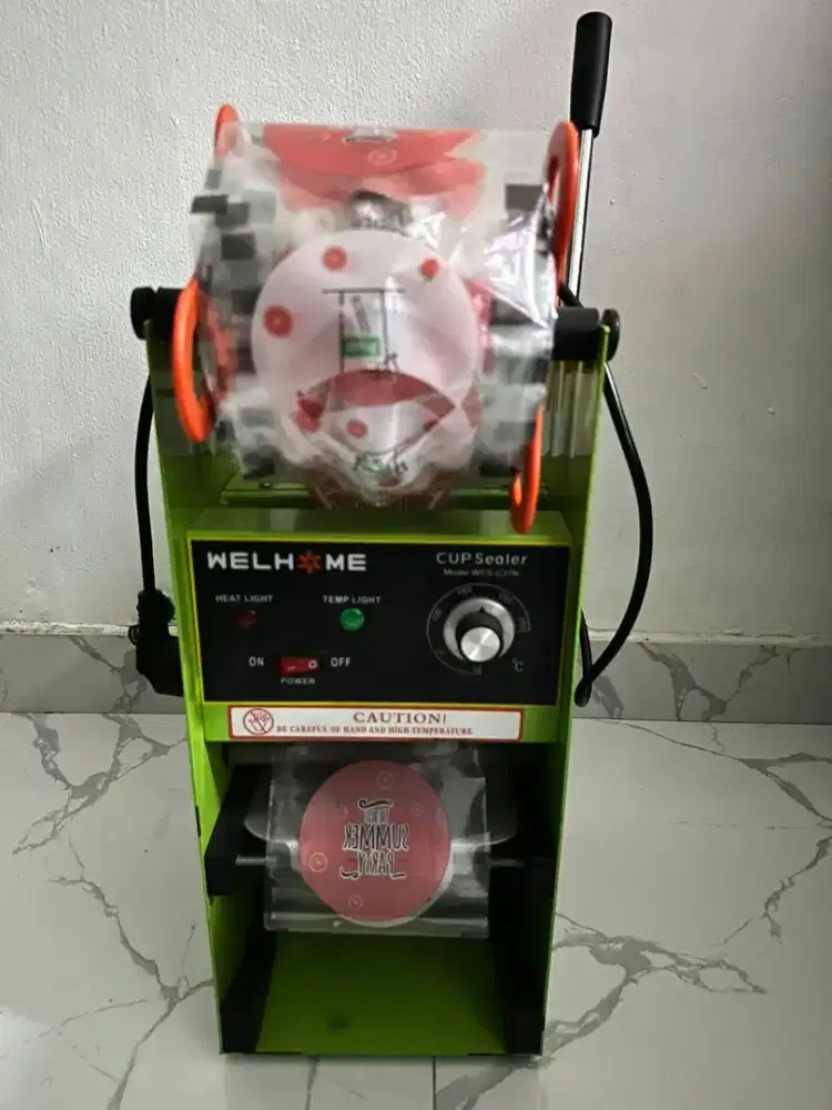 Mesin cup sealler