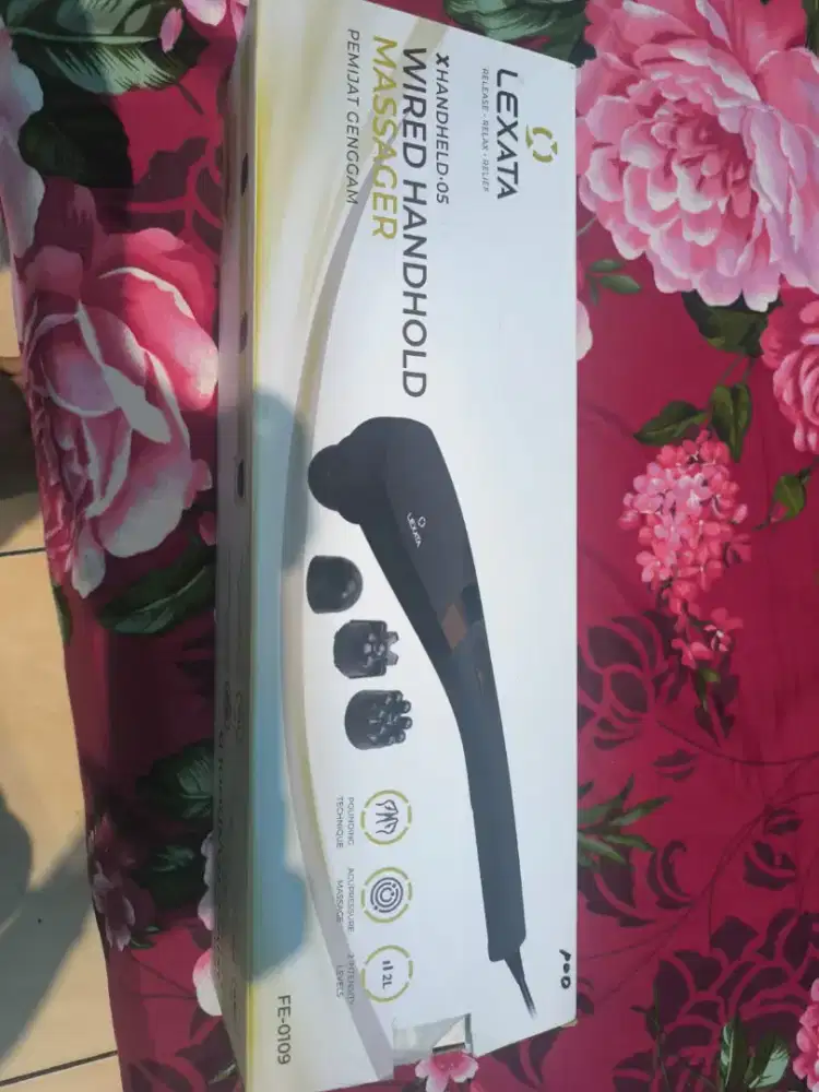 Lexata pemijat genggam