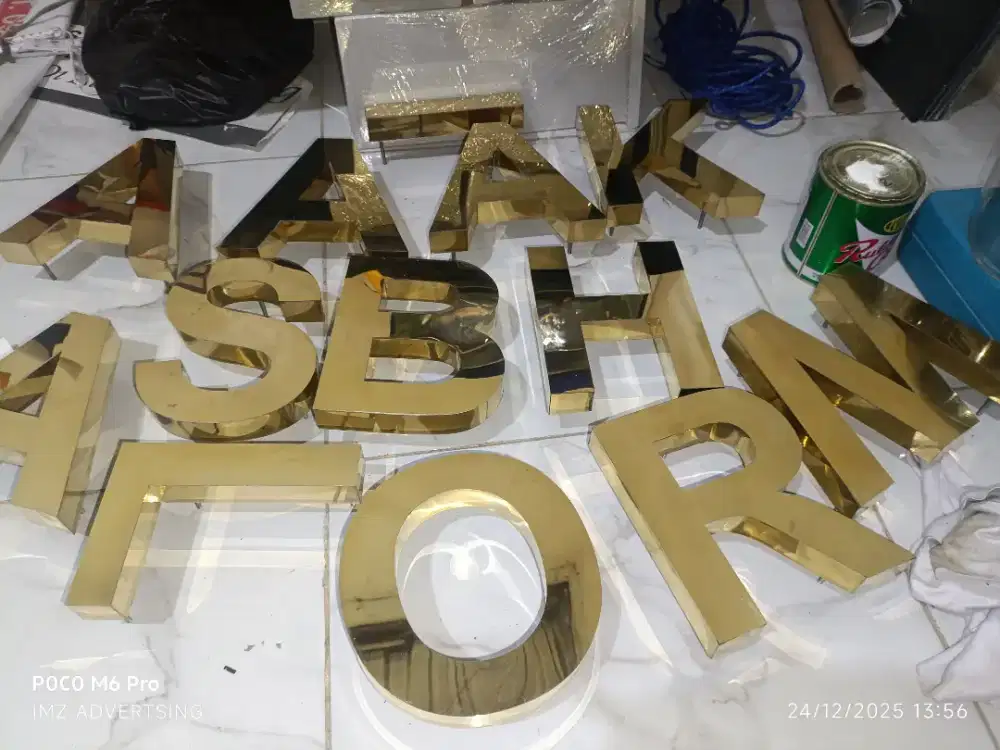 Huruf timbul stenles gold