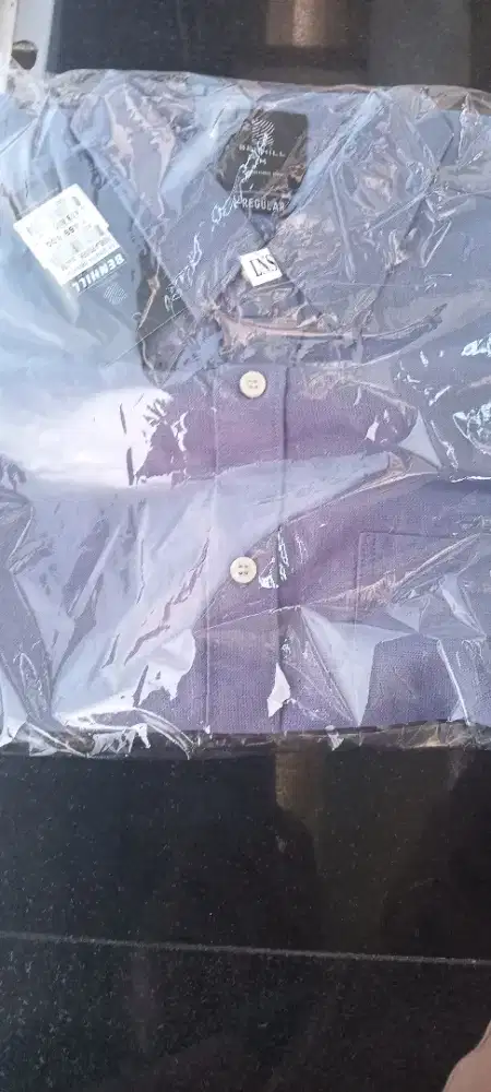 Bju lengan pendek masih baru blom dipakai masih ada segel