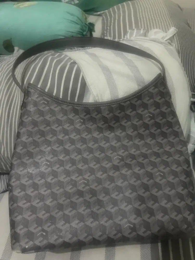 tas christy ng aluna