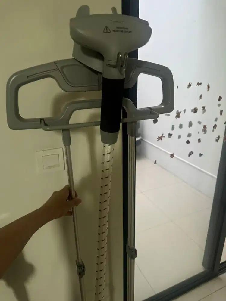 Setrika uap , panas dan tidak merusak baju