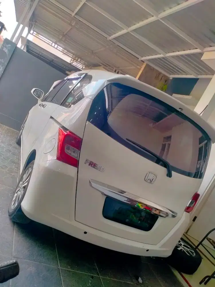 FREED 2013 WARNA PUTIH AC SUDAH DOBLE