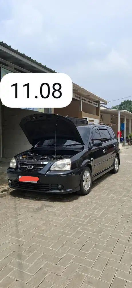 Kia Carens II 2006 Bensin