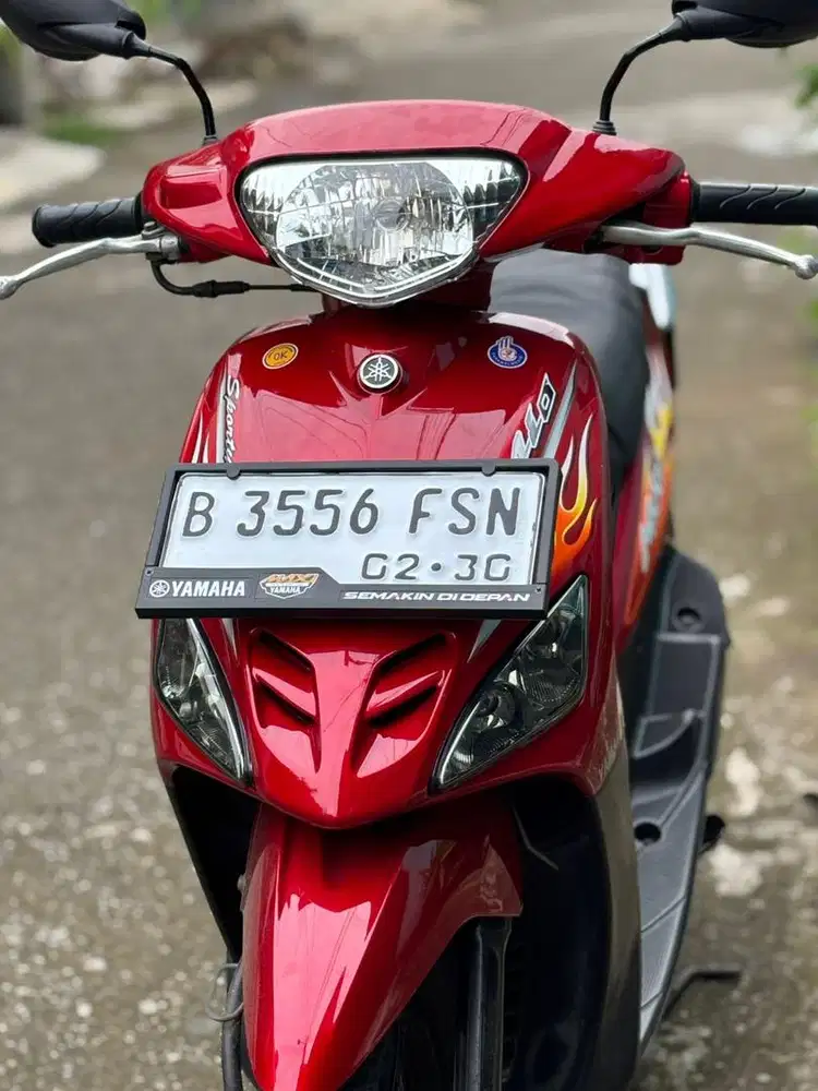 Mio Sporty 5TL merah maroon