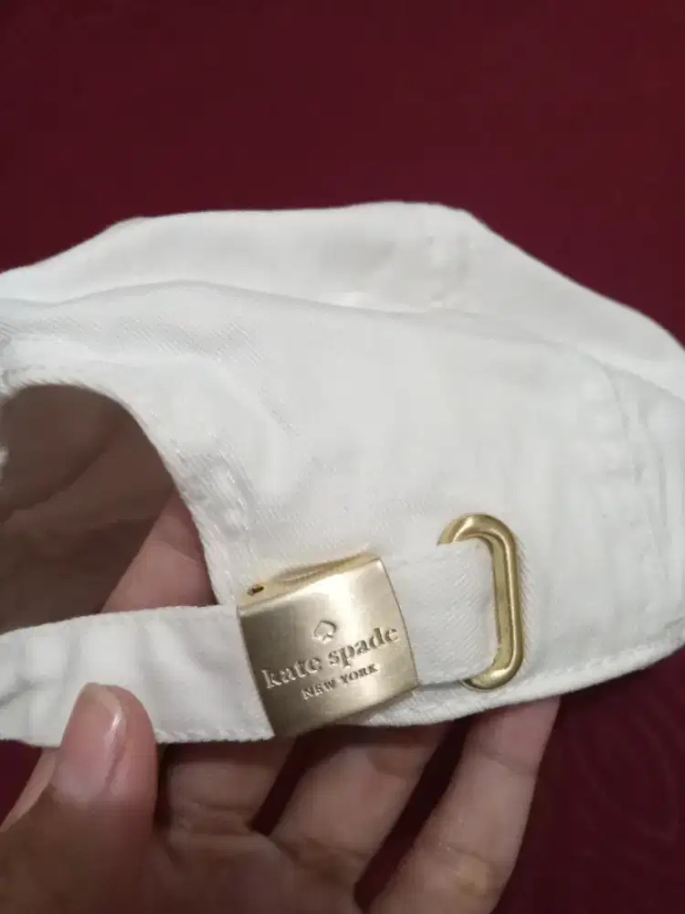 Topi Kate spade putih