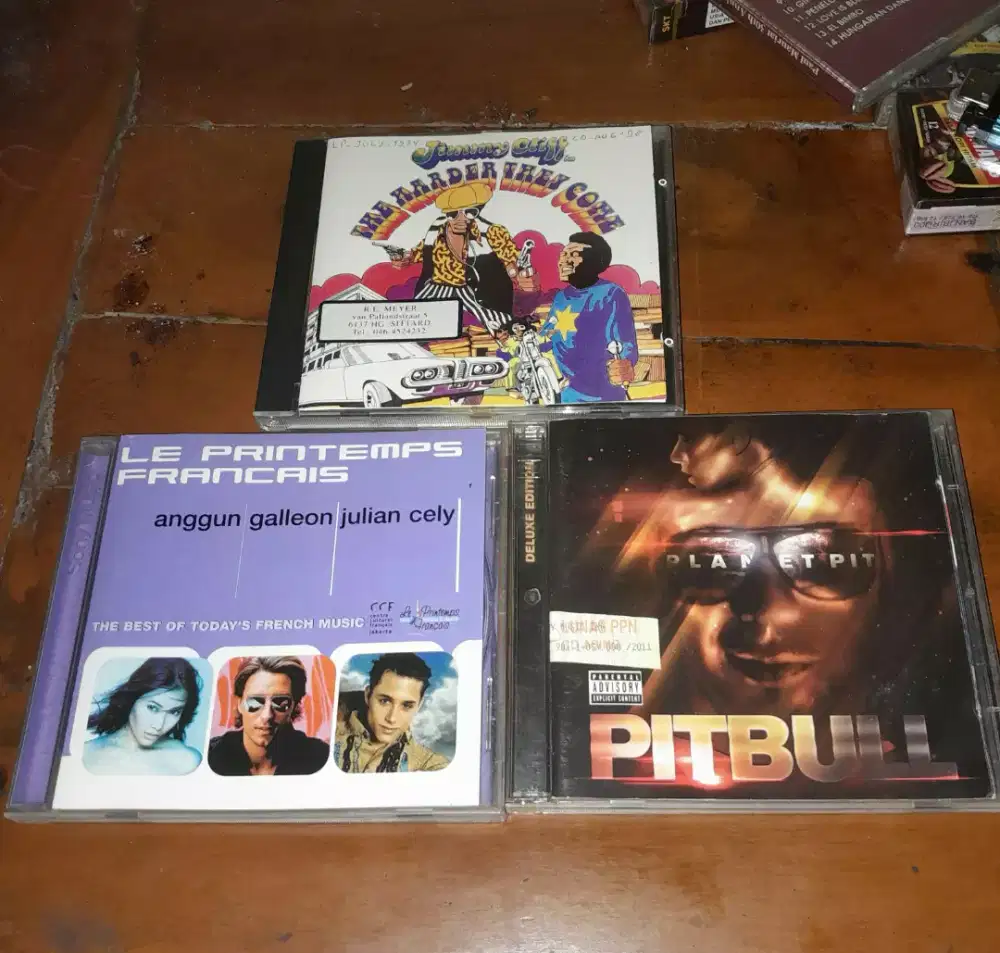 CD musik sepaket Anggun C Sasmi Jimmy cliff dan Pitbull